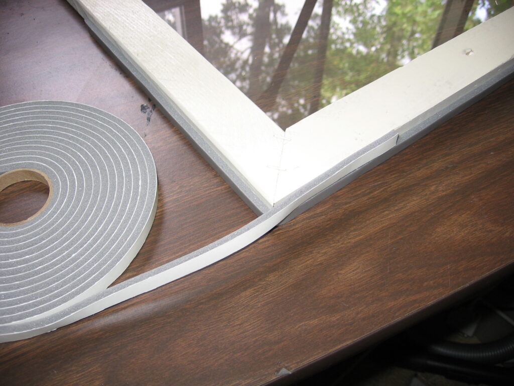 To install do-it-yourself storm windows, attach foam weatherstripping around the frame to seal against the ­window opening and to hold it in place.