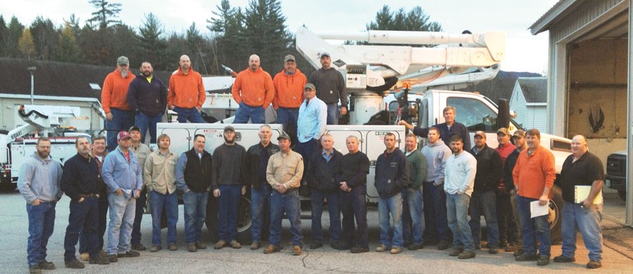 After several long days of repairing Hurricane Sandy damage at New Hampshire Electric Cooperative, some of the Illinois electric co-op linemen gathered for a group picture. The Illinois co-ops sending help included: Adams Electric Cooperative, Corn Belt Energy, Eastern Illini Electric Cooperative, Egyptian Electric Cooperative Association, EnerStar Electric Cooperative, Jo-Carroll Energy, Rural Electric Convenience Cooperative, Shelby Electric Cooperative, SouthEastern Illinois Electric Cooperative, Tri-County Electric Cooperative and Wayne-White Counties Electric Cooperative.