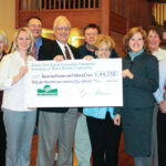 Shown at the Savanna Museum and Cultural Center GeoAlliance geothermal check presentation from left, front row, are: Heidi Weber, Jo-Carroll Energy Manager of Member Relations and Marketing; John LeComte, Savanna Historical Society (SHS) Board Member; Jeannine Mills, SHS Board Member; Nancy McDonald, Association of Illinois Electric Cooperatives Marketing Administrator; and Larry Stebbins, Mayor of Savanna. Pictured from left, back row are: John Scott, Jo-Carroll Energy, Inc. Energy Advisor; Jean Jones, SHS Treasurer; State Senator Mike Jacobs; Gene Wright, SHS Board Member; Carol Wright, SHS Board Member; and Keith Brown, SHS Vice-President.
