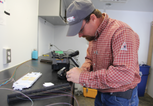  Prairie Power, Inc. Substation Foreman and Primary Fiber Splicer Ryan Ruppel enjoys his new job, but says it requires precision and patience. The fiber is hair thin, incredibly strong and very brittle if you bend it. 