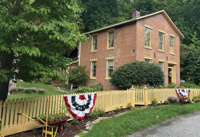 The 1859 Greek Revival parsonage in Elsah was built 15 years before the church across the street.