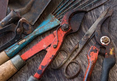 dirty tools - vintage garden tools on wooden background