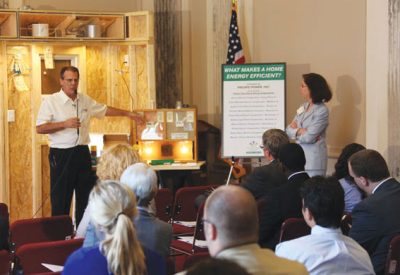 lectric co-ops across the country have been preaching and teaching energy efficiency for years. Bob Dickey, manager of marketing and economic development for Eastern Illini Electric Cooperative took his “sermon” to congressional staffers on Capitol Hill using the co-op’s energy wall. The 18 foot-long energy wall uses compressed air flowing through the display to demonstrate potential energy losses that could easily be plugged with proper caulking, insulation and various sealants. Co-op officials gave policymakers an opportunity to experience the same energy-efficiency messages more than 300,000 co-op consumer-members in the nation’s heartland have been able to share. “We know we can reduce the energy costs on the vast majority of homes by 20 to 40 percent,” says Dickey. “Many homes were built decades ago and they leak like sieves.”
Source: Kevin Bernson