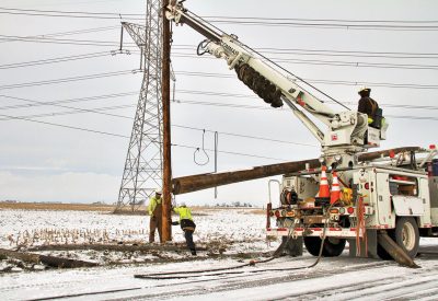 Ice, wind and flood waters hit two Illinois electric cooperatives just after Christmas, ­leaving some members without power for several days. But co-op linemen from across the state came to aid Corn Belt Energy crews replace more than 100 broken poles. Record rainfall in late December also caused massive problems for rural areas across the state.