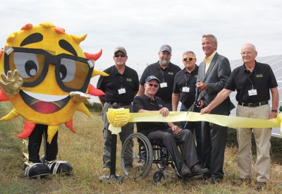 EnerStar Electric Cooperative directors, and mascot “Ray,” were on hand for the ribbon cutting by CEO Mike Clark. Shown left to right are: Danny Gard, Jr., Jeff Zimmerman, Robert Staley II, Kevin Julian, Clark, and Tom Jones.