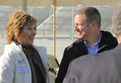 In 2015, USDA Rural Development Director Coleen Callahan helped dedicate the Shelby Electric Cooperative solar farm with Shelby Electric President/CEO Josh Shallenberger.