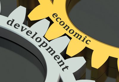 Economic Development concept on the gearwheels