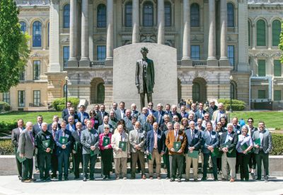 Coop reps gather in front of Abraham Lincoln statue outside of Illinois State Capital
