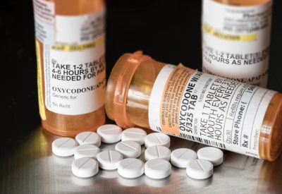 Prescription medication bottles and pills