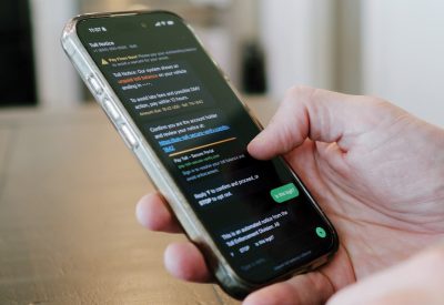 SMS Tolls Scam Text Simulation Concept - Smishing Attacks Threaten Action for Unpaid Tolls to Collect Sensitive Information and Financial Data Concept