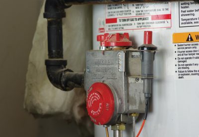 Setting your water heater to 120 degrees F will save energy and keep the water at a safe temperature. Photo Credit: Scott Akerman