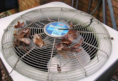 Clean leaves and other debris from the top of the central air conditioner or heat pump, even though many will blow away by themselves when the unit starts.